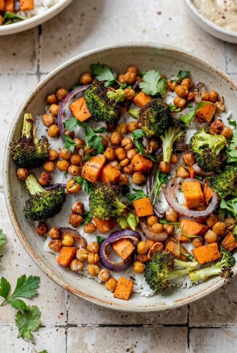 sweet potato chickpea sheet pan dinner recipe - Sweet Potato Chickpea Sheet Pan Dinner served in a white bowl overhead view