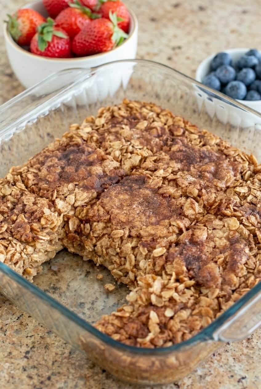 amish baked oatmeal recipe - Amish Baked Oatmeal served in a white bowl overhead view