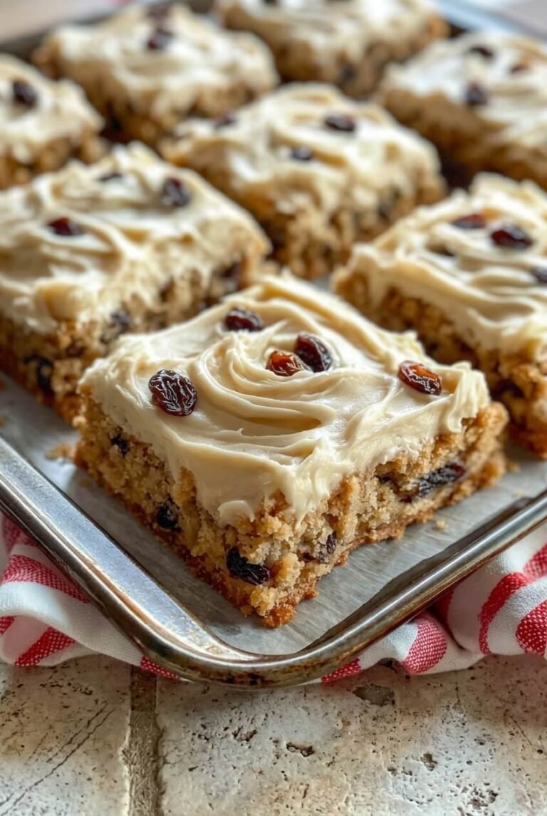 oatmeal raisin cookie bars recipe - Oatmeal Raisin Cookie Bars served in a white bowl overhead view